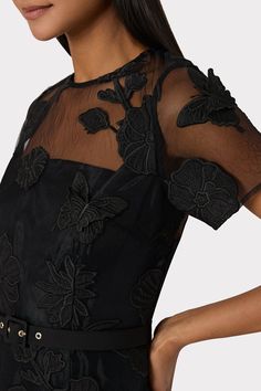 Patterned with our signature 3D butterfly and floral appliqué, the intricate design serves as an overlay on this short sleeved mini dress. It’s fitted throughout the bodice and flares out past the waist. Perfect for cocktail hour. Black Mini Dress With Floral Embroidery For Party, Elegant Black Embroidered Short Sleeve Dress, Black Short Sleeve Embroidered Dress With Floral Details, Neutral Color Dresses, Luxury Floral Embroidered Knee-length Mini Dress, Luxury A-line Mini Dress With Floral Embroidery, Milly Dress, Button Outfit, Short Sleeve Mini Dress