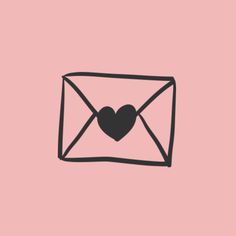 an envelope with a heart in it and the word love is written on its side