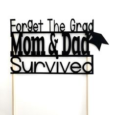 a cake topper that says forget the grad mom and dad survived