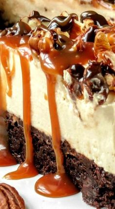 a piece of cheesecake with caramel drizzle and pecans