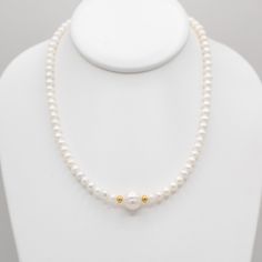 What can you always count on? Pearls to remain timeless year after year. Necklace is made with 6mm freshwater pearls and an 8mm pearl in the center centered between 14k gold filled rondelles. Necklace is finished with spring ring clasp. Measures 16 and 18 inches in length. Adjustable Pearl Necklace With Round Beads For Anniversary, Adjustable Round Beads Pearl Necklace For Anniversary, Adjustable Rondelle Pearl Necklace For Gift, Rondelle Single Strand Pearl Necklace Gift, Single Strand Rondelle Pearl Necklace Gift, Rondelle Pearl Necklace With Pearl Charm As Gift, Everyday Single Strand Pearl Necklace With Round Beads, Anniversary Pearl Necklace With Charm, Gift Single Strand Rondelle Pearl Necklace