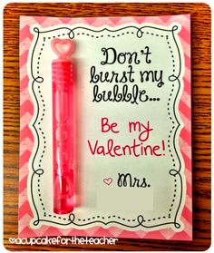 a valentine's day card with a pink pen