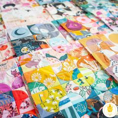 the colorful quilt has many different designs on it