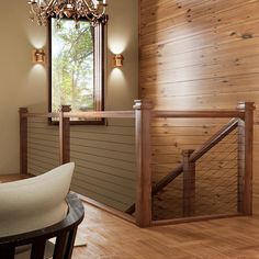 a room with wood paneling and a chandelier