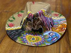 I add colors to anything you would like to wear. I work with customers individually and the whole process takes about 3-5 days. If you like what you see, reach out to me and we ll make your world brighter! ✨Beautiful Stylish hand painted hat/Sombrero ✨ Each Style is unique ✨Perfect for adding an extra special touch to your outfit. Also can be used as an art piece hanging on the wall.  ✨ - Medium Size- One Size fits most Multicolor Bohemian Handmade Fedora, Unique Multicolor Beach Hat, Bohemian Multicolor Handmade Fedora, Unique Adjustable Multicolor Hats, Handmade Multicolor Hats For Rodeo, Unique Handmade Fedora For The Beach, Unique Handmade Fedora For Beach, Artistic Handmade Hat As Gift, Handmade Artistic Hat As Gift