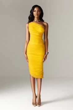 'Natasha' is our gorgeous one shoulder creation, cut from our soft stretch organza mesh with a flattering ruched overlay and special power mesh for a figure sculpting fit in a pretty yellow hue. The one shoulder neckline features a delicate style. It's fully lined for comfort and zips up the center back for easy on. WHERE TO WEAR:Pretty date nights, Romantic dinner dates, weddings, glam functions and events. UNDERWEAR SOLUTION:No bra required as it's cupped and line. Lining: Fully LinedMade from Dinner Date Dress, Mustard Outfits, Yellow Cocktail Dress, Yellow Bodycon Dress, Petite Cocktail Dresses, Figure Sculpting, Cocktail Dress Yellow, Mesh Midi Dress, Yellow Midi Dress