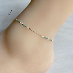 "Beaded ankle bracelet in three styles. Dainty chain with tiny beads. Gold plated brass chain. Chain length: 8.5\" Extension: 1.75\"" Minimalist Delicate Chain Anklet For Summer, Dainty Summer Anklets, Adjustable Beaded Chain Anklets For Summer, Dainty Adjustable Chain Anklets For Summer, Summer Gift Beaded Chain Anklets, Summer Dainty Anklet With Adjustable Chain, Dainty Summer Anklet With Adjustable Chain, Minimalist Hypoallergenic Anklets For Summer, Hypoallergenic Minimalist Summer Anklets