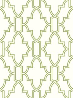 a green and white wallpaper with an intricate design on the back side of it