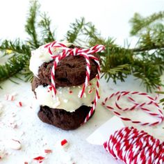 two cookies are stacked on top of each other with candy canes