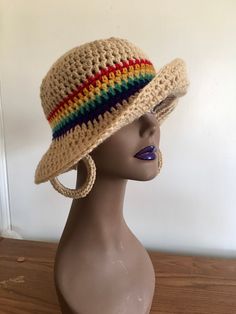 Hand Crochet women Sun Hat and Earring set.  Crochet Summer Sun Hat. Large brim can be folded in different ways fir a different look.  Its soft and comfortable. You can wear it with many outfits. It is very hip and chic, everyone should have one of these hats in their closet for good or bad hair day!  Care instructions: Machine washable on gentle cycle or can hand wash in cold, roll flat in towel to absorb most of the moisture. Lay flat to dry. Any questions, please contact me Multicolor Brimmed Cloche Hat, Adjustable Multicolor Cloche Hat For Beach, Adjustable Multicolor Wide Brim Cloche Hat, Adjustable Multicolor Crochet Hat With Short Brim, Handmade Brimmed Cloche Hat, Adjustable Bohemian Sun Hat For Winter, Summer Mini Hats Made Of Yarn, Adjustable Crochet Mini Hats For Festivals, Adjustable Brown Crochet Hat For Festivals