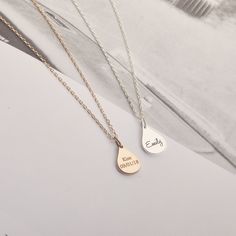 This necklace can be personalized with your loved one's fingerprint or handwriting. Please specify your personalization in the NOTE TO SELLER section when you check out. T E A R ∙ D R O P ∙ N E C K L A C E D E T A I L S * Material: Sterling Silver, 18K Gold Plated , 18K Rose Gold Plated * Length: 16in, 18in, 20in, 22in * Diameter: 15mm x 10mm If you have any questions, please click CONTACT SELLER button. Our team will respond to your request as soon as we can. Everyday Minimalist Customized Charm Necklaces, Minimalist Necklace With Engraving Option For Keepsake, Minimalist Keepsake Necklace With Engraving Option, Minimalist Charm Necklaces With Engraving Option For Personalized Gift, Minimalist Charm Necklaces With Engraving Option, Personalized Teardrop Pendant Keepsake Jewelry, Everyday Meaningful Customizable Necklace, Minimalist Personalized Necklace For Keepsake, Minimalist Customizable Charm Necklace For Mom