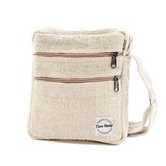 Product Description The Beige Hemp Crossbody Bag is for the urban man or woman who wants to be stylish, eco-conscious, and look trendy while on the go. This over the shoulder bag features 4 zippered pockets. Our crossbody sling bag doesn't just look good-- it also has great features for the Environmentally friendly person. It's made from 100% hemp, its eco-conscious, sustainable and water repellent, making it one of a kind in functionality and style: plus its vegan! Isn't your new bag tailored to suit you like no other? Get yourself a cross body purse that is perfect for any occasion! Take to festivals, concerts, or to use as your everyday side bag. So stylish and unique it will go with any outfit! Features Handmade in Nepal Vegan, Eco-Friendly and Fair Traded Machine wash safe: (Cold) Lar Eco-friendly Shoulder Bag With Zipper Pocket, Rectangular Shoulder Bag With Ykk Zipper For Daily Use, Daily Use Tote Bag With Ykk Zipper, Eco-friendly Travel Bag With Zipper Closure, Casual Bags For Everyday Use, Eco-friendly Bag With Zipper Pouch For Everyday Use, Eco-friendly Tote Bag With Zipper Pocket, Eco-friendly Bags With Zipper Pouch For Everyday Use, Eco-friendly Everyday Bags With Zipper Closure