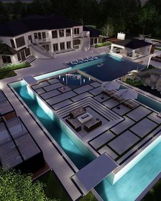 an aerial view of a house with a swimming pool