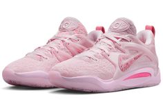 a pink nike basketball shoe on a white background