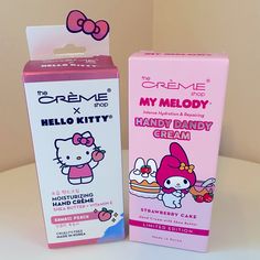 two boxes of hello kitty hand and candy cream