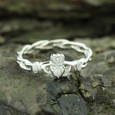 Claddagh ring, ladies claddagh ring on celtic rope band set with a beautiful opal gemstone measuring 1.75mm. This claddagh ring measures 6.5mm from the top of the crown to the bottom of the heart. This elegant Diamond Claddagh Celtic Ring is available in silver or 9K, 14K or 18K. Also in Platinum. Made in our workshop in Dublin, Ireland. FREE SHIPPING TO UNITED STATES AND EUROPE. 60 DAY RETURNS. The Claddagh is my favorite ring style to make because of its strong recognizable culture identity an Claddagh Engagement Ring, Claddagh Necklace, Irish Wedding Rings, Diamond Claddagh Ring, Claddagh Ring Wedding, Funky Accessories, Fun Costumes, Irish Ring Claddagh, Septum Rings