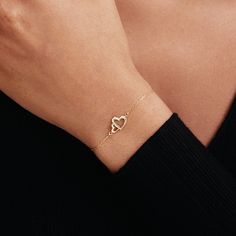 "1- P R O D U C T ∙  D E S C R I P T I O N Showcase your love with our Interlocking Heart Bracelet in 14K Solid Gold. Perfect as a couple bracelet or a stunning gift for her, this double heart bracelet captures the essence of romance. Crafted from 14k solid gold, it adds a touch of luxury to any outfit. This 14k gold jewelry is not just a purchase, but an investment in timeless style. 2- P R O D U C T ∙  D E T A I L S Gold material: 14K solid gold Choice of gold color: Yellow gold, Rose gold, White gold Choice of chain length: 5\", 5.5\", 6\", 6.5\", 7\" +1\" Extender Dimensions: * Height: 9 mm /  0.35 in * Width: 12 mm /  0.47 in 3- S H I P P I N G ∙ A N D ∙ R E T U R N S We know you're excited to get your hands on your order, and we're just as excited to get it in your hands. We take pri Elegant Heart-shaped Diamond Bracelet As Gift, Elegant Heart Shaped Diamond Bracelet For Gift, Elegant Heart-shaped Diamond Bracelet For Gift, Elegant Heart-shaped Diamond Bracelet Gift, Elegant Heart-shaped Diamond Bracelet For Valentine's Day, Personalized Diamond Bracelet For Everyday Wear, Elegant Heart Cut Bracelet As A Gift, Elegant Heart Cut Bracelet Perfect As A Gift, Dainty Heart Bracelet For Valentine's Day