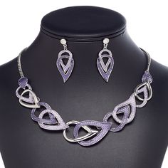 This ready-to-wear necklace with matching earrings is ideal for gift-giving, counter sales or extending current jewelry lines. Comfort clutch earnuts included. Colors, shapes and sizes may vary in each lot. Wear Necklaces, Necklace And Earring Set, Copper Necklace, Everyday Jewelry, Dark Purple, Light Purple, Matching Earrings, Lobster Claw, Gift Necklace