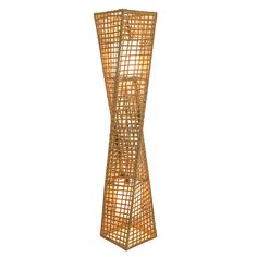 a tall wooden sculpture with lights on it's sides and an intricate design in the middle