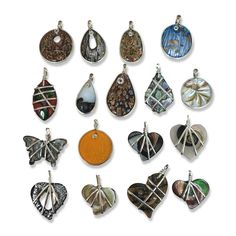 a group of nine pendants with different shapes and colors are shown in this image