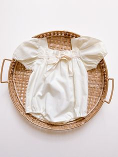 Vintage-style baby romper with balloon sleeves and feminine details delicately crafted from naturally breathable cotton.  It is both a great everyday choice and special occasion wear.  - Snaps for easy diaper changes - Color: Light Yellow - Square neck with tie detail  - Elastic leg opening - 100% Cotton Yellow Baby, Feminine Details, Cotton Romper, Baby Yellow, Baby Romper, Balloon Sleeves, Light Yellow, Sleeve Cotton, Color Light