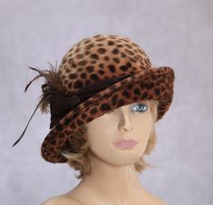 This beautiful ladies cloche is made from long velour fur felt, and hand draped over an antique hat block. Trimmed with a beautiful silk dupioni and feathers. Please indicate your head size measurement when ordering (measure your head horizontally just above your eyebrows). When you receive your hat, there will be a small ribbon inside to fine-tune the fit, and a hat box for safe storage. Note: Colors will vary depending on your monitor and there will also be some variations due to dye lots. I p Elegant Luxury Fur Felt Cloche Hat, Cloche Hat Pattern In Fur, Ralph Lauren Looks, Cloche Hats, Kinds Of Hats, Silk Dupioni, Hat Blocks, Antique Hats, The Villages