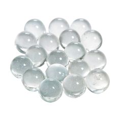 PRICES MAY VARY. 500 round stones with smooth surface Perfect for vase filler, flower vase, fish tank, bowls, art / crafts projects, flower arrangement, mosaics, table scatter, and more Translucent - Light will shine through Each stone is measured 14 mm diameter (1/2" in diameter) 3.8 lbs bag is measured 10" L x 7.5" W x 1" H. Fills up approx 5 cups Ideal for home decor and wedding projects! These lustrous bag of glass gems look great scattered across a tablecloth, placed as filler in vases, use Filled Vases, Plastic Champagne Flutes, Marble Home, Mixed Media Crafts, Wedding Party Supplies, Glass Gems, Vase Fillers, Glass Marbles, Glass Ball