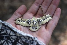 "This listing is for one hand stamped brass hawk necklace. Wear this bohemian necklace to show your affinity and love for all things natural, spiritual, and sky-bound. It is a powerful and eye-catching piece. - Hawk is made from 18 gauge brass sheet metal. This is a sturdy piece- it is not flimsy. - Pendant measures 3\" by 1 1/4\" (75mm by 30mm) - Chain in photo measures 16\" from end to end, but can be lengthened to your preference. Choose at check-out! Also, I can suspend it on black or brown Bohemian Hand Stamped Necklace Gift, Bohemian Hand Stamped Necklace For Gift, Bohemian Etched Necklaces For Festivals, Handmade Southwestern Gold Necklace, Bohemian Engraved Brass Necklaces, Southwestern Handmade Gold Necklace, Bohemian Stamped Jewelry For Jewelry Making, Bohemian Brass Stamped Jewelry, Bohemian Stamped Brass Jewelry