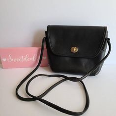 Vintage CoachQuincy BagBlack leather with brass hardwareRoomy interior with slip pocketcovered by a flap and securedwith a turnlockMade in the United States#B5D-9919Measures: 9"L, 7"H, 3"WStrap measures: 52"Can be worn over shoulder or crossbody if possible Made in the United StatesCleaned, conditioned and ready to wear!Questions? Just askMore vtg coach styles/colors also availableLr Classic Flap Shoulder Bag With Brass Hardware, Classic Crossbody Satchel With Snap Closure, Vintage Crossbody Flap Bag For Formal Occasions, Classic Double Flap Shoulder Bag With Cc Turnlock Closure, Classic Shoulder Bag With Cc Turnlock For Daily Use, Vintage Crossbody Flap Bag For Formal Events, Classic Shoulder Bag With Cc Turnlock And Double Flap, Classic Shoulder Flap Bag With Brass Hardware, Classic Daily Use Shoulder Bag With Cc Turnlock Closure