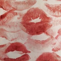 an image of red lips drawn on paper