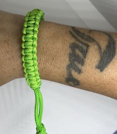 This boho braided friendship bracelets are an expression of our freedoms, uniqueness, and simplicity.   The Green bracelet is made using macrame square knot was used to create a ladder. We are always able to climb to green pastures.  The color green has a lot of meaning to it, Life, Fertility, Resurrection, New Beginnings and vegetation.  Psalm 1:3 The bracelets are made of waterproof micro cord. Macrame Waterproof Arm Band Promise Armlet Christian Trinket KJV Wristband Spiritual Ornament Religi Cheap Everyday Green Braided Bracelets, Cheap Trendy Green Braided Bracelets, Macrame Square, Macrame Square Knot, Bible Verse Bracelet, Braided Friendship Bracelets, Green Pastures, Spiritual Bracelets, Psalm 1