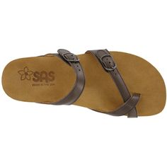 Start tab labels Description Details Start tab content This slip-on sandal has a leather toe-loop and adjustable features including an elasticized buckle across the in-step. A contoured insole supports the natural arch of the foot. Fine leather straps wrap around the base with a hand-polished wood effect, giving this sandal a stylish flair. Heel Height: 1.625". A fun slip-on sandal with a leather strap toe-post and unique adjustable features. Fine leather straps wrap around a base with a hand-po Brown Toe Post T-strap Sandals, Brown Synthetic Toe Post T-strap Sandals, Brown Synthetic T-strap Sandals With Toe Post, Adjustable Synthetic Toe Ring Sandals With Single Strap, Brown Open Toe Flip Flops With Arch Support, Adjustable Brown Slides With Arch Support, Brown Synthetic Toe Loop Sandals, Brown Footbed Sandals With Arch Support And Round Toe, Brown Slides With Cork-bed Midsoles And Single Toe Strap