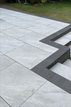 a man riding a skateboard down the side of a cement ramp