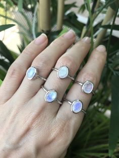 "A stackable sterling silver ring featuring a faceted oval-shaped Rainbow Moonstone set in a simple bezel setting, which makes a great birthstone ring for those June Birthdays. Wrapped in a box ready for gift giving.(r-new-29) Rainbow Moonstone measure 8mm x 6mm *Follow us @belesasjewelry on Instagram for promotions/giveaways *LIKE* us on Facebook http://www.facebook.com/Belesas to find special coupon codes *If you like the ring, please click on the \"Pin It\" icon ------------------------------ Minimalist Oval Cabochon Jewelry, Adjustable Stackable Oval Midi Rings, Dainty Oval Stackable Midi Rings, Oval Sterling Silver Midi Rings For Gift, Sterling Silver Oval Midi Rings For Gift, Minimalist Oval Stackable Rings With Bezel Setting, Stackable Oval Midi Rings As Gift, Stackable Oval Midi Rings For Gift, Stackable Oval Midi Rings Gift