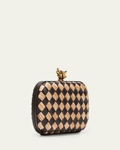 Bottega Veneta minaudière bag in intrecciato leather and raffia     Structured top with knot liftclasp closure     Approx. 5"H x 7.5"W x 2"D    Made in Italy Designer Woven Leather Rectangular Clutch, Luxury Woven Leather Rectangular Clutch, Designer Rectangular Woven Leather Clutch, Luxury Rectangular Woven Leather Clutch, Rectangular Clutch With Intrecciato Weave For Evening, Designer Evening Clutch With Intrecciato Weave, Designer Woven Leather Clutch For Evening, Evening Clutch With Intrecciato Weave, Luxury Evening Clutch With Intrecciato Weave