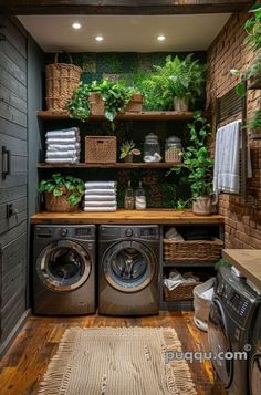 a washer and dryer in a small room with plants on the shelves above