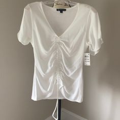 Sexy Inc Pull String Blouse In White. You Can Adjust The Front To The Amount Of Ruching You Like. V Neck Nwt. 18” Pit To Pit. 24” Long Fitted Summer Tops With Drawstring, Chic Stretch Top With Drawstring, Chic Stretch Tops With Drawstring, Summer Fitted Drawstring Tops, Fitted Drawstring Tops For Summer, Spring V-neck Top With Drawstring, V-neck Drawstring Top For Spring, Spring V-neck Drawstring Top, Trendy Ruched Stretch Blouse