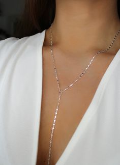 ♥ Lariat Necklace ♥ 925 silver, lasso, y-necklace, drop necklace, hanging necklace, delicate, minimalistic silver necklace, silver y-necklace * Material: Chain and clasp are plated with 925 silver.  * Size: The upper part is 48cm / 19" long. The hanging part measures 12cm / 4.75". 🌊100% hypoallergenic and long lasting ✨Our jewelry is crafted from high-quality materials. 💌FREE WORLDWIDE SHIPPING Ready to ship in 1-3 business days How long until your jewelry arrives? 2-7 business days: EU 5-12 b Silver Lariat Long Necklace, Long Necklace Silver, Silver Long Drop Lariat Necklace For Wedding, Elegant Silver Long Drop Lariat Necklace, Timeless Silver Lariat Necklace, Elegant Silver Y-shape Lariat Necklace, Silver Y Necklace, Minimalist Jewelry Silver, Hanging Necklaces