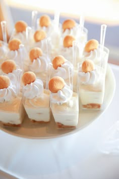 small desserts are arranged on a white plate