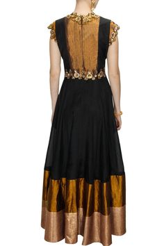 This black colour anarkali salwar kameez made in gorgette fabric. Yoke part of this anarkali salwar kameez is made in antique fabric having beautiful neckline in zari. Border of this anarkali suit is made in antique fabric Dupatta of this anarkali suit is made in net fabric in black colour. Designer Black Anarkali Set With Cutdana, Black Anarkali Set With Cutdana For Designer Wear, Black Churidar With Cutdana For Festive Occasion, Black Cutdana Churidar For Festive Occasions, Black Cutdana Churidar For Eid, Festive Black Anarkali Set With Cutdana, Black Floor-length Anarkali Set With Cutdana, Elegant Black Salwar Kameez With Cutdana, Black Churidar With Cutdana For Wedding