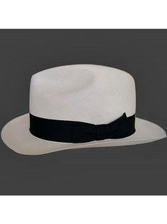 Brand: Gamboa PremiumColor: Natural Material: Toquilla Straw Brim: 8 cm. (3 1/10")Grade: 40 (Museum Select)learn more Sweatband: Cotton Twill, 3 cm. (1.18") Crown: 11 cm. (4 3/10") Ribbon: Linen Description: With the highest grade of straw weaving attainable, this luxurious hat is an absolute work of art. It is handmade in Montecristi, the worldwide famous Panama Hat town in Ecuador. This Panama Fedora hat, classic and elegant will be yours for a lifetime. Each hat is individually hand blocked a White Flat Brim Fedora For Formal Occasions, White Panama Hat With Curved Brim For Formal Occasions, White Curved Brim Panama Hat For Formal Occasions, Formal White Panama Hat With Curved Brim, Classic Fedora With Curved Brim, Classic Flat Brim Panama Hat For Formal Occasions, Classic Panama Hat With Flat Brim For Formal Occasions, White Brimmed Panama Hat For Formal Occasions, White Formal Panama Hat With Short Brim