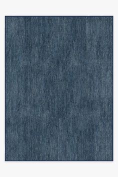 an area rug with dark blue colors