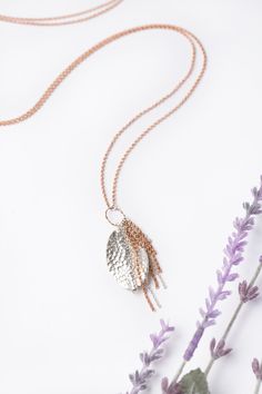 A fun design to compliment the Rosebud Collection, perfect for those who value versatility. Featuring a rose gold chain with a unique hill tribe fine silver pendant, this design can be worn at 38.5" as a longer layer, or simply use the sterling silver lobster claw clasp to create a shorter design resting at 19.75" Rose Gold (Lead & Nickel Free) Hill Tribe Fine Silver 19.75 or 38.5" convertible with sterling silver lobster claw clasp We hand select our natural materials, thus there may be slight Artisan Rose Gold Sterling Silver Jewelry, Sterling Silver Rose Gold Necklace With Large Pendant, Silver Hammered Copper Necklace, Rose Gold Lariat Necklace In Sterling Silver, Rose Gold Sterling Silver Lariat Necklace, Handmade Sterling Silver Charm Necklace In Rose Gold, Handmade Rose Gold Charm Necklace In Sterling Silver, Handmade Rose Gold Sterling Silver Charm Necklace, Rose Gold Sterling Silver Dangle Necklaces