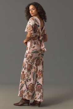 This Kachel dress is a true stunner, featuring flutter sleeves, a breezy slip silhouette, and a playful pattern. | Flutter-Sleeve Slip Dress by Kachel in Pink, Women's, Size: 4, Viscose at Anthropologie Pink Floral Print Dress With Ruffle Sleeves, Pink Ruffle Sleeve Dress With Floral Print, Spring Flowy Dresses With Kimono Sleeves, Spring Dresses With Flowy Fit And Kimono Sleeves, Flowy Spring Dresses With Kimono Sleeves, Spring Dresses With Flowy Kimono Sleeves, Spring Dresses With Kimono Sleeves, Feminine Floral Print Dress With Ruffle Sleeves, Flowy Dress With Kimono Sleeves For Brunch