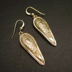 "Hand carved anglo saxon medieval kite shield museum earrings. Earrings design inspired by medieval Britain shields from the 12th century during the reign of the Anglo-Saxon and Vikings. A kite shield is a large, almond-shaped shield rounded at the top and curving down to a point or rounded point at the bottom. The term \"kite shield\" is a reference to the shield's unique shape, and is derived from its supposed similarity to a flying kite. - Hand sculpted and domed - Solid yellow bronze also ca Medieval Britain, Kite Shield, Shield Medieval, Medieval Earrings, Viking Earrings, Flying Kite, Tarpon Springs, Bronze Earrings, Earrings Design