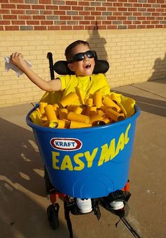 a young boy in a wheel chair made out of cheese