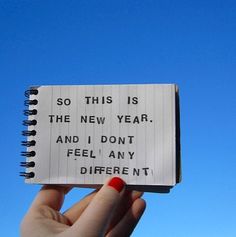 someone holding up a notepad with the words so this is the new year and i don't feel any different