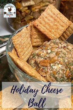 holiday cheese ball in a glass bowl with crackers on the side and text overlay that reads holiday cheese ball