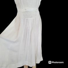 Vintage embroidered white on white linen dress circa 1940s. Florence label.  I'm trying to provide info without triggering the algorithm since this is a vintage fashion item not affected by sanctions. Fingers crossed! From that island south of Miami is this WW2 era tropical summer linen day dress with white on white embroidery. Scalloped short sleeves, few front pleats, side zip, and a snap inside each shoulder where shoulder pads would've attached (no shoulder pads). The matching belt has two s White Victorian Vintage Summer Dress, Vintage Linen Wedding Dress, Vintage White Linen Dresses, White Lined Vintage Dress For Daywear, White Summer Vintage Dress For Vintage Events, Summer Vintage Dress For Vintage Events, White Lined Vintage Dress, White Embroidered Vintage Dress, Vintage White Embroidered Dress