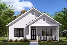 a small white house with black windows on the front porch and balcony railings is shown